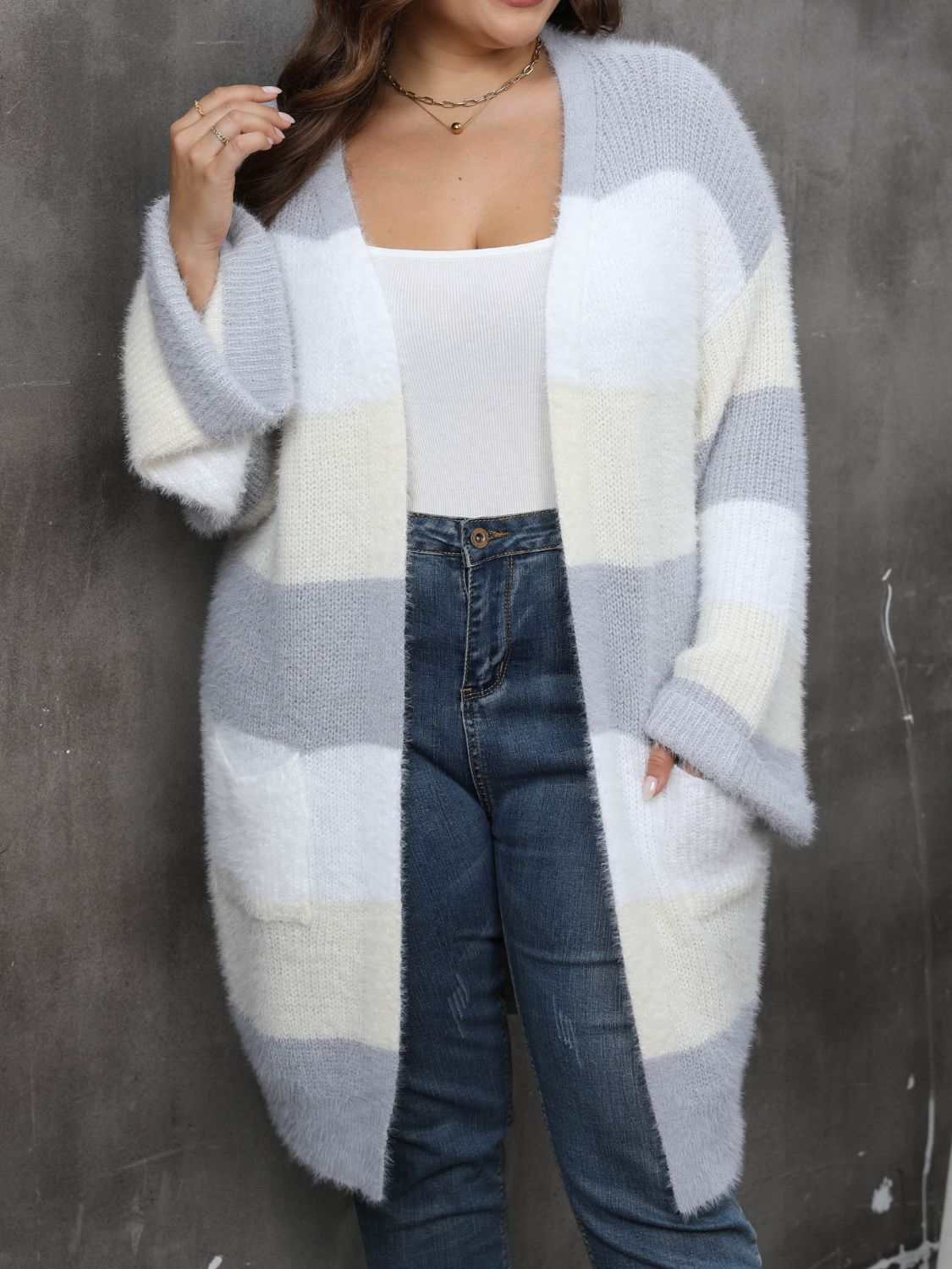 Plus size open front long sleeve cardigan in gray and white stripes with moderate stretch.