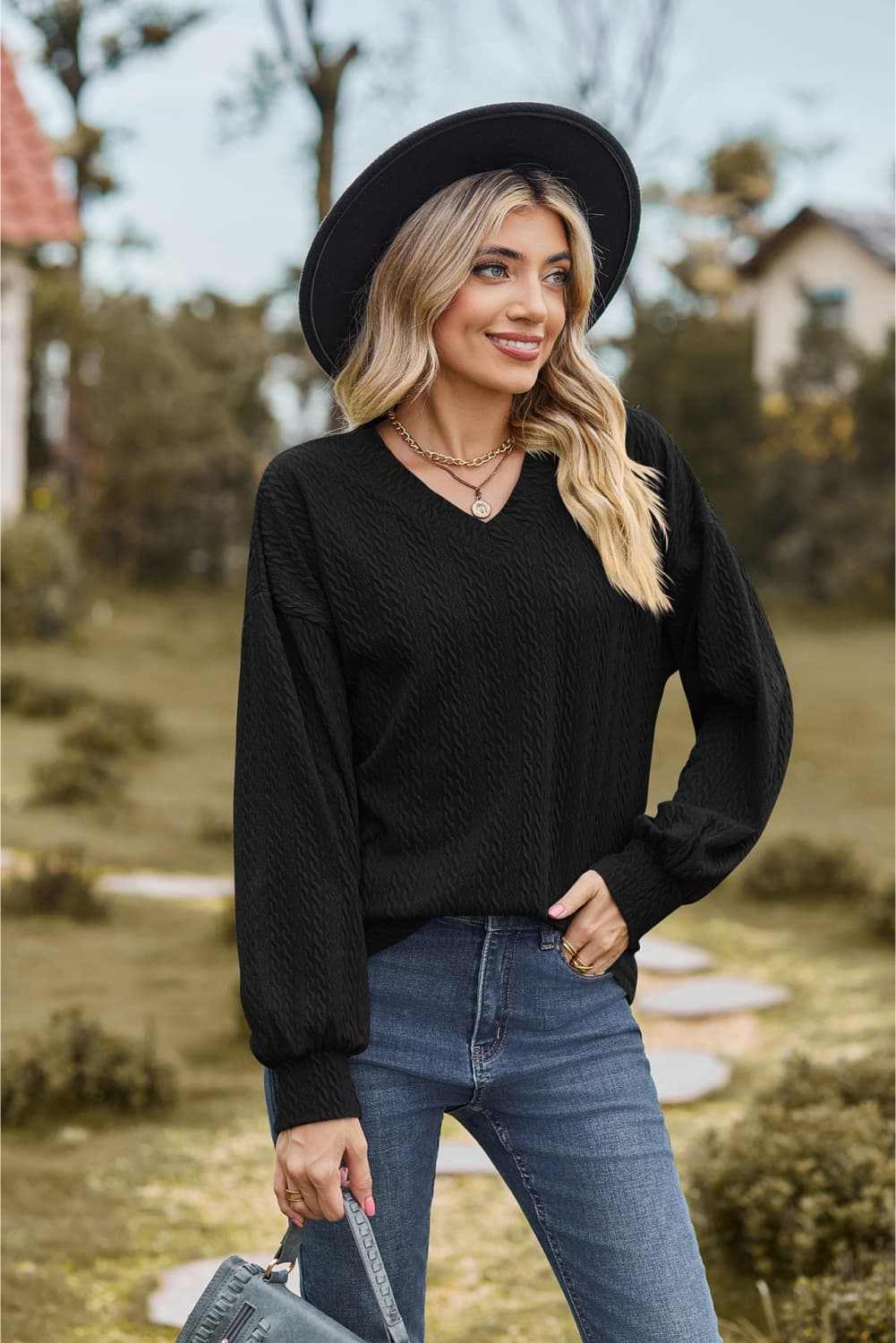 V-Neck Dropped Shoulder Blouse with long sleeves, casual style, solid black color.