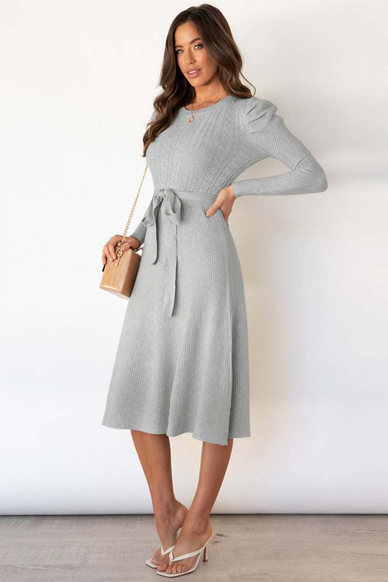 Round neck long sleeve tie waist sweater dress in gray, highly stretchy and opaque.