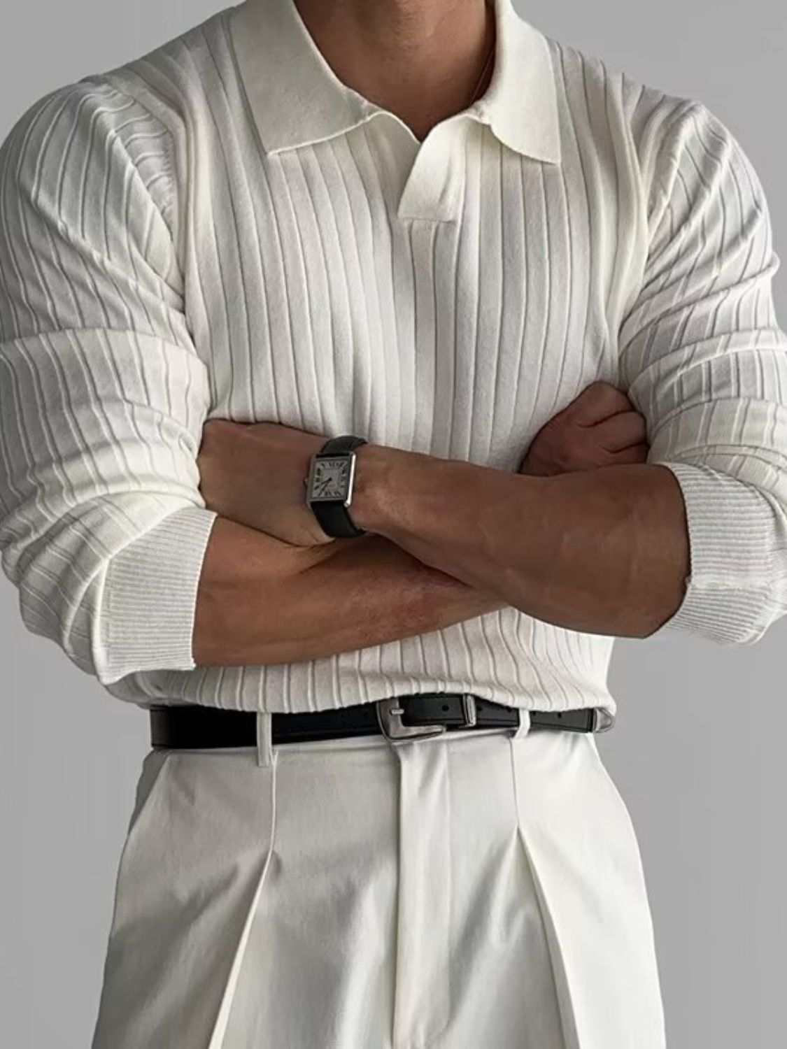 Men's plus size collared neck long sleeve polo with moderate stretch.