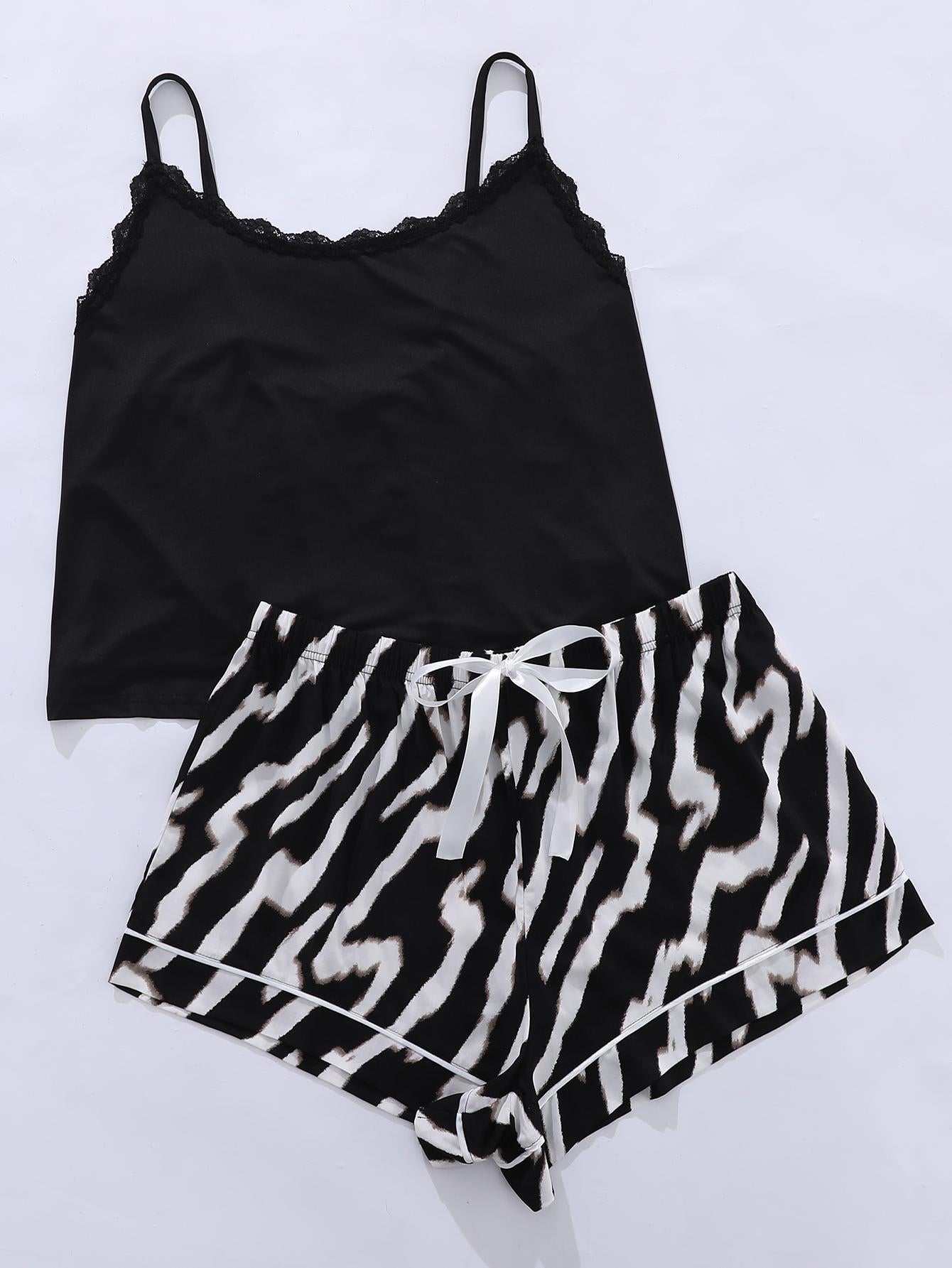 Plus size lace trim scoop neck cami and animal print shorts pajama set.