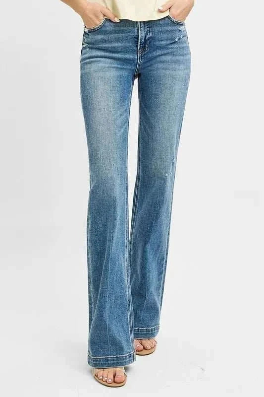 RISEN full size distressed bootcut jeans in mid-blue stretch denim for plus size with vintage fade