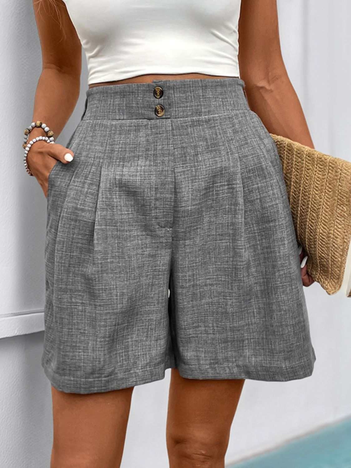 Perfee Frill Shorts with pockets, featuring buttoned design, 100% polyester material.
