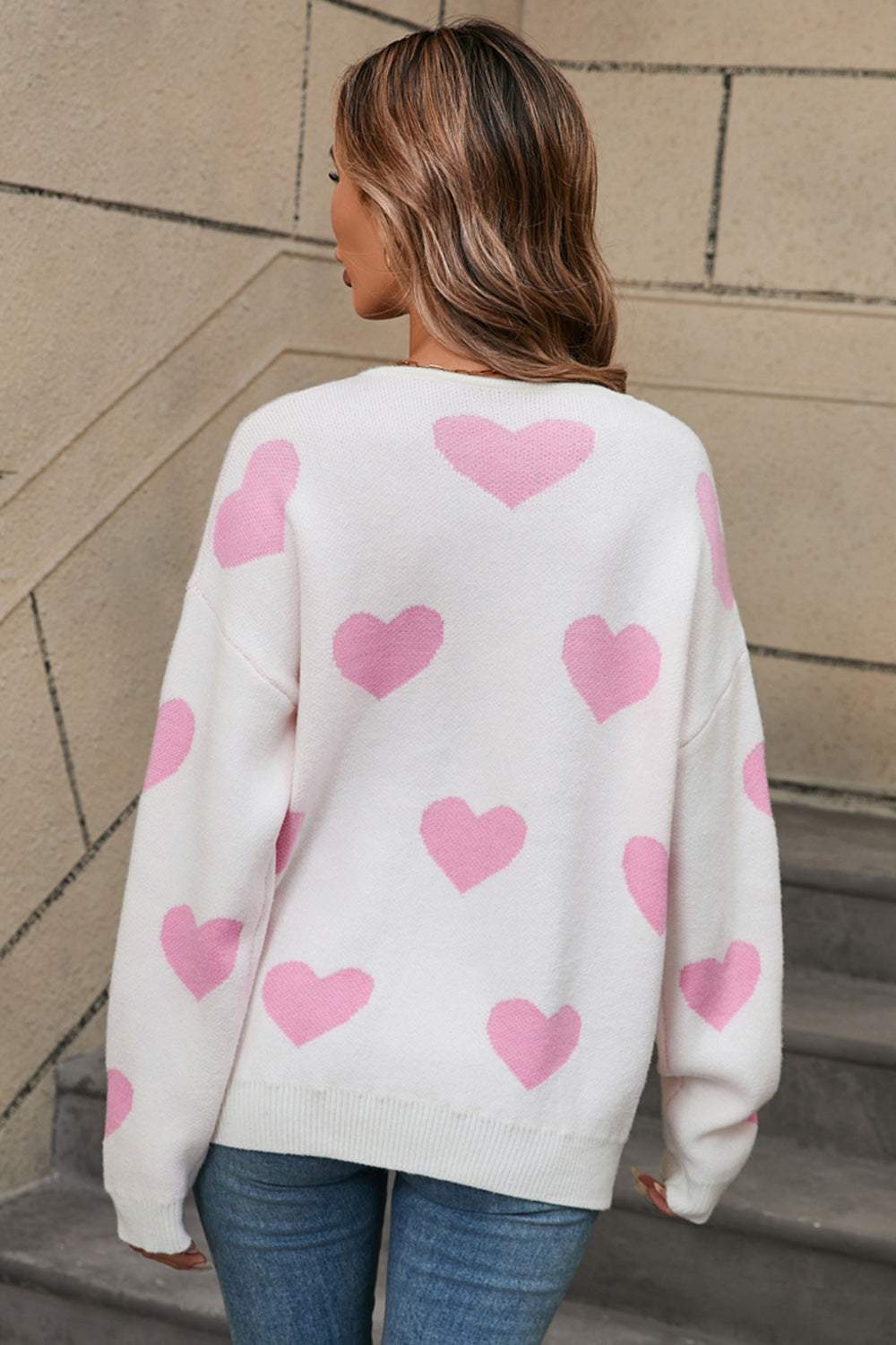 Angel Wings Heart Round Neck Dropped Shoulder Sweater in white with pink hearts, back view.