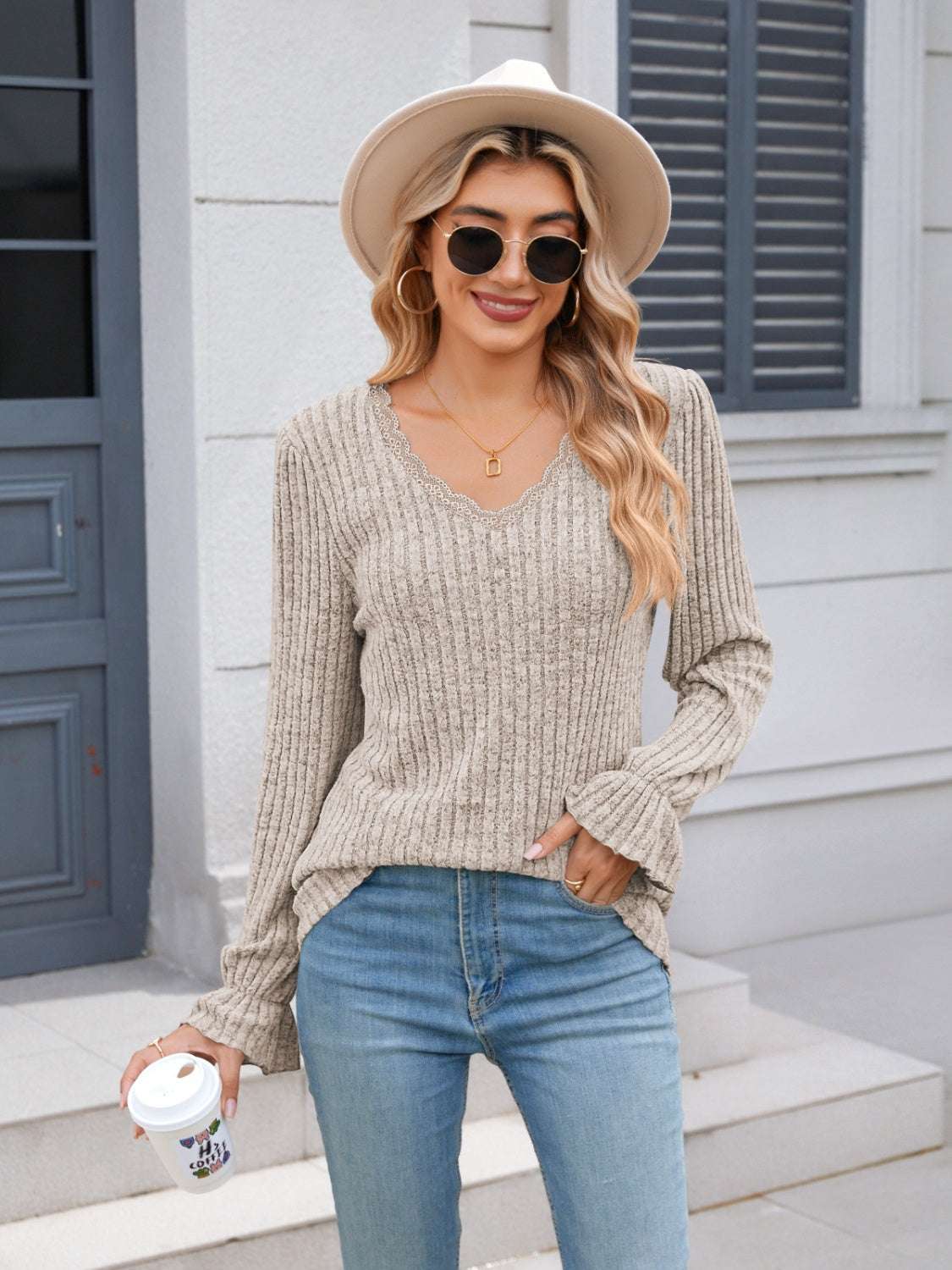 Lace detail V-neck long sleeve T-shirt with ruffled cuffs, slightly stretchy polyester fabric, and casual style for women.