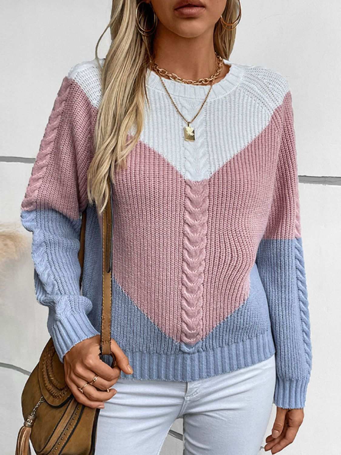 Color block round neck long sleeve sweater in pastel tones with braided detailing.