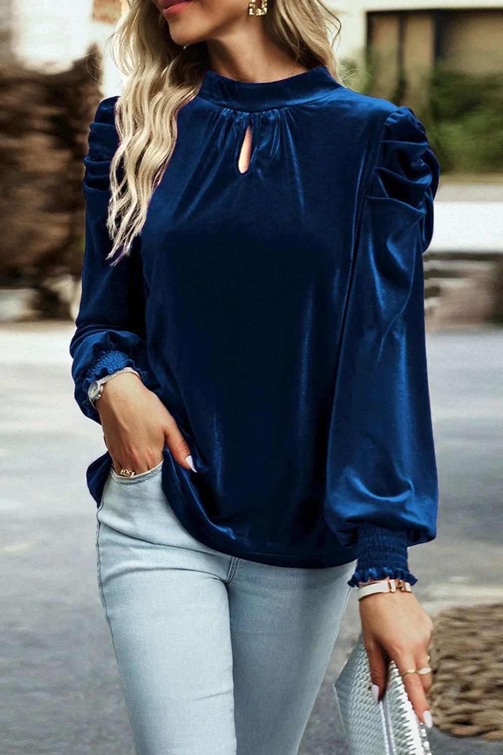 Mock neck velvet fabric long sleeve blouse with tie-up detail, slightly stretchy, and opaque.
