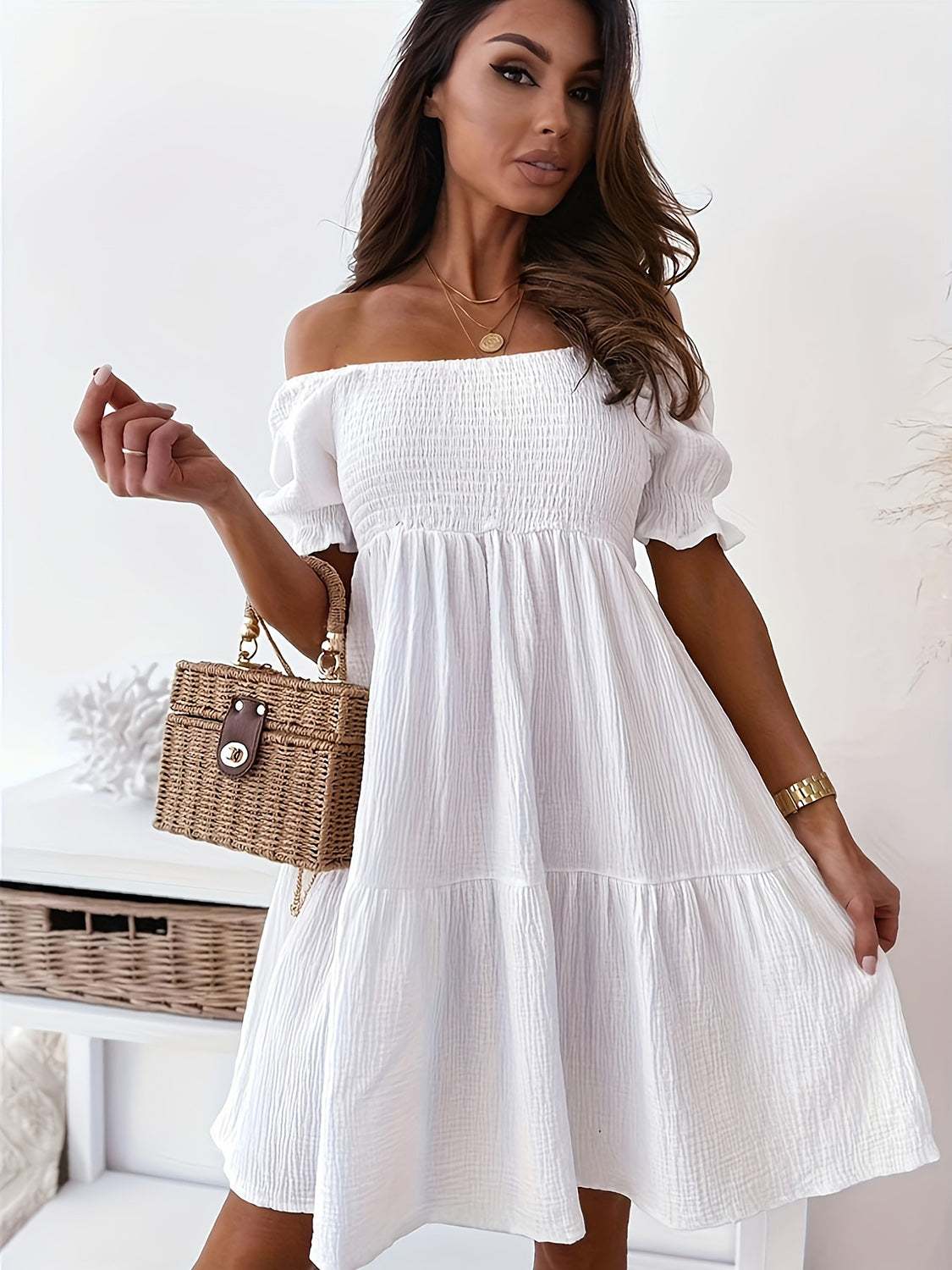 Full size white ruffled off-shoulder short sleeve dress, slightly stretchy polyester-cotton blend.