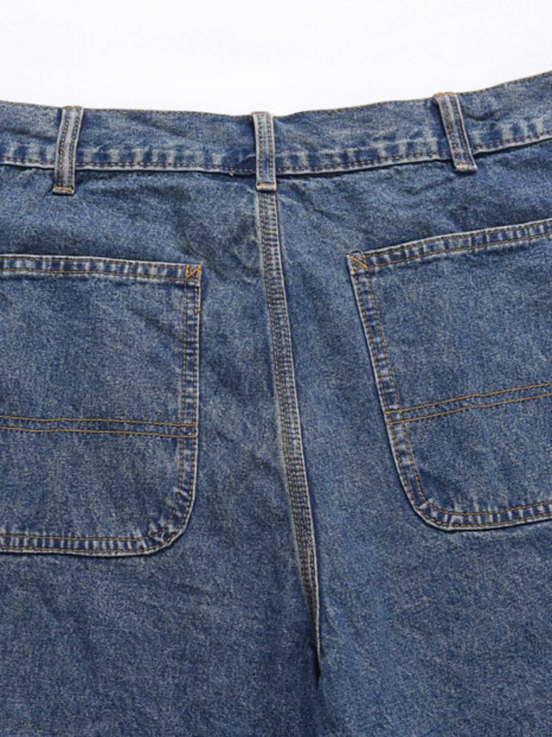 Men's washed denim bermuda shorts with back pockets.