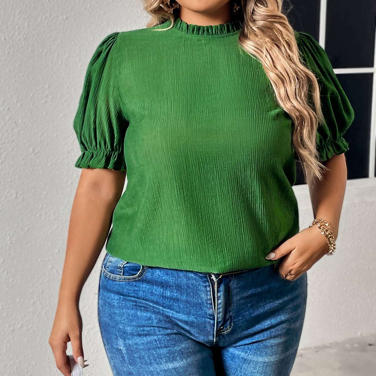 Plus size green round neck blouse with flounce puff sleeves.