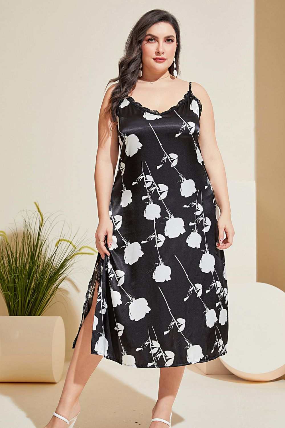 Plus size floral lace trim side slit night dress with V-neck and sleeveless design.