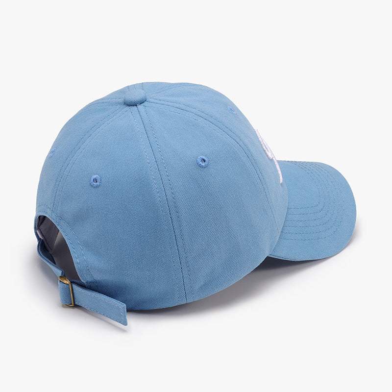 Bow Embroidered Cotton Baseball Cap in blue fabric, adjustable strap, and embroidered bow design.
