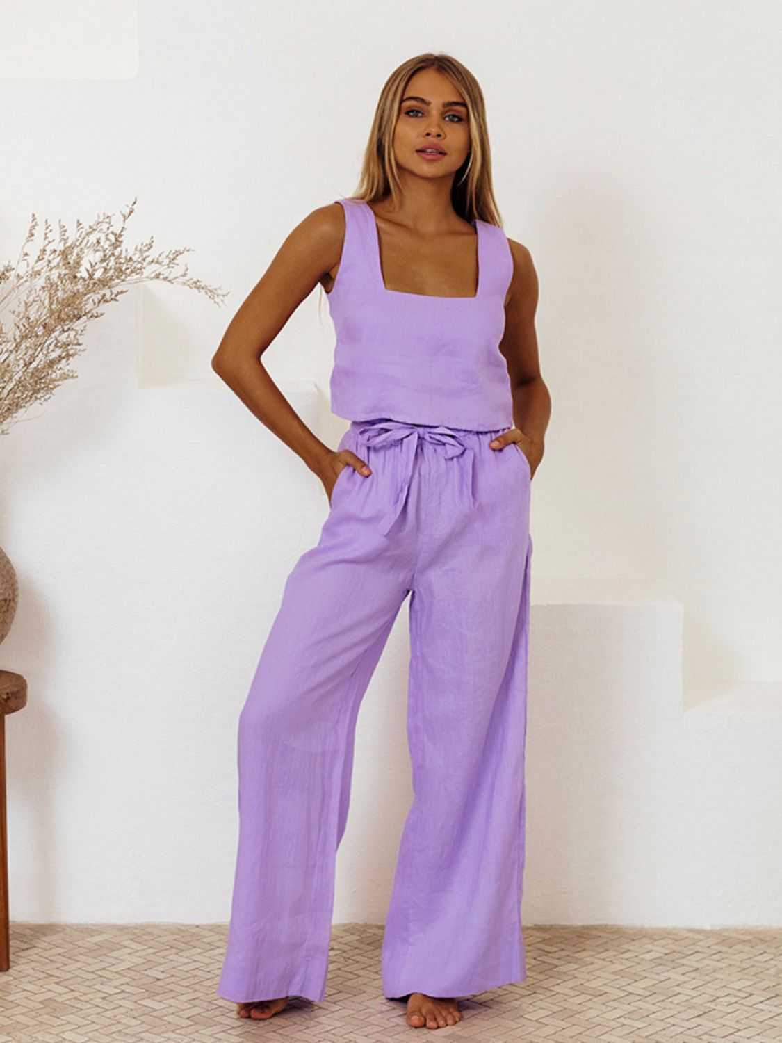 Square neck sleeveless top and pants set in lilac color.