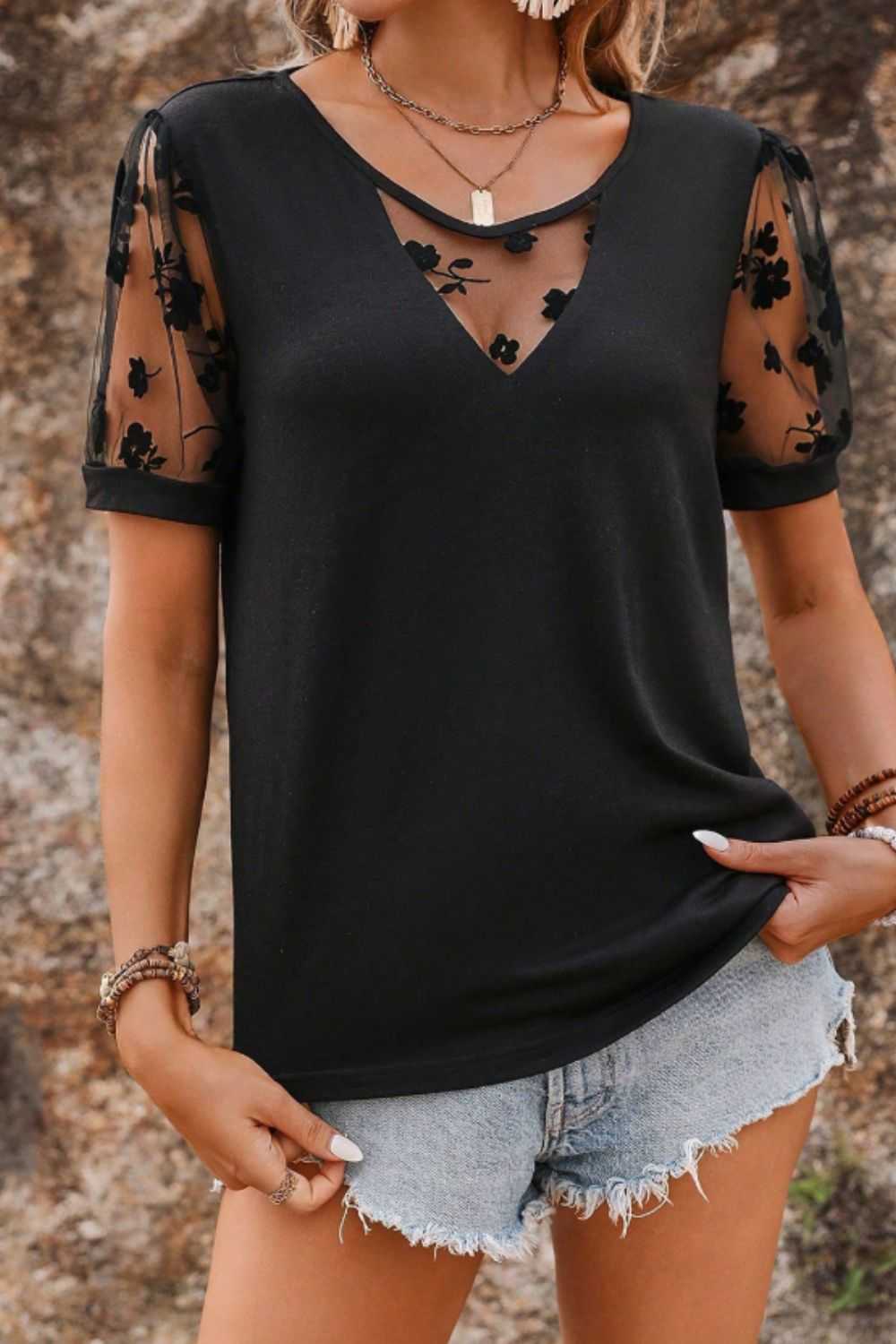 Flora Lace Patchwork Crew Neck Top with semi-sheer floral sleeves.