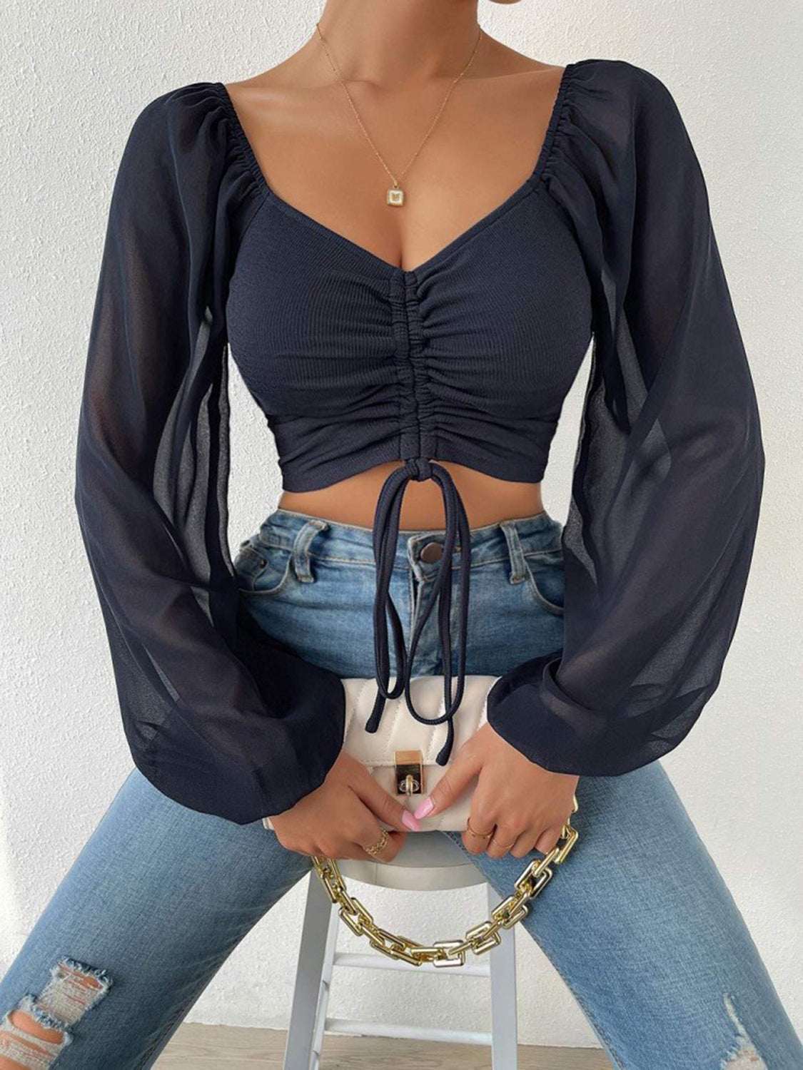 Drawstring Sweetheart Neck Cropped Top, semi-sheer black pullover with long sleeves.