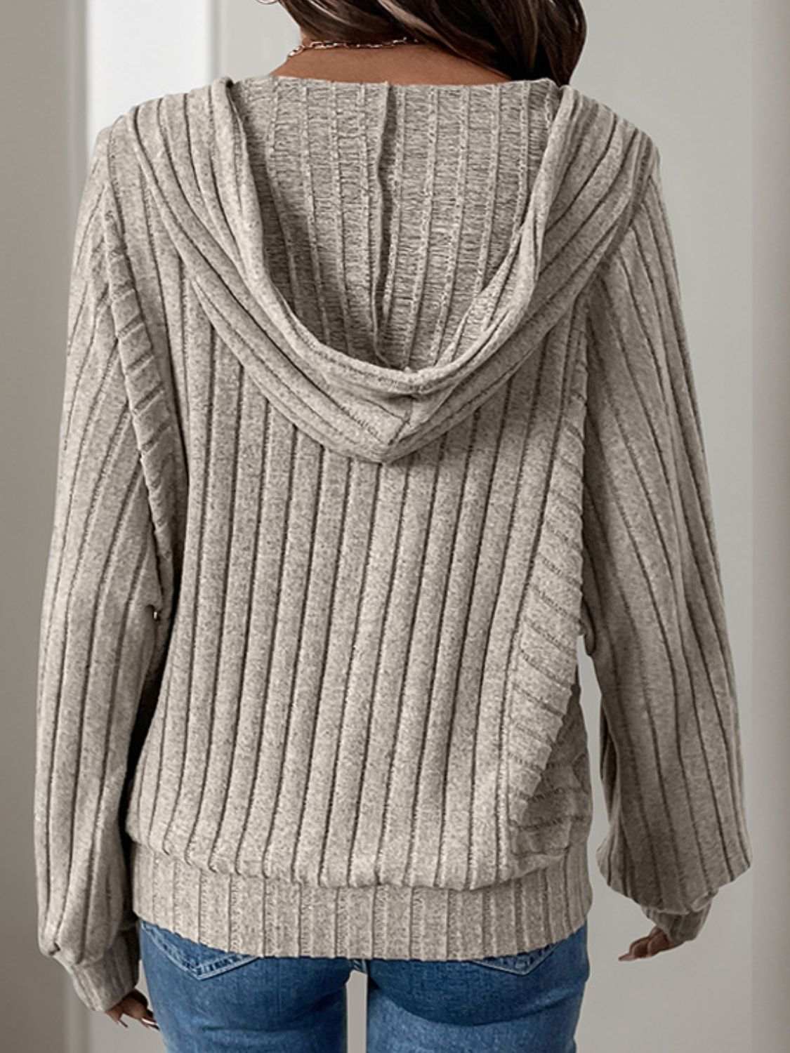 Perfee drawstring long sleeve hoodie with buttoned design, moderate stretch, and ribbed texture.