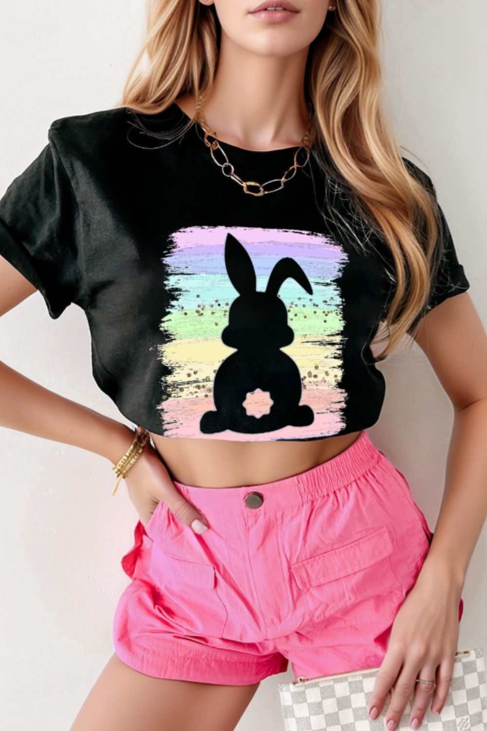 Rabbit round neck short sleeve t-shirt, black with rainbow background, rabbit silhouette.