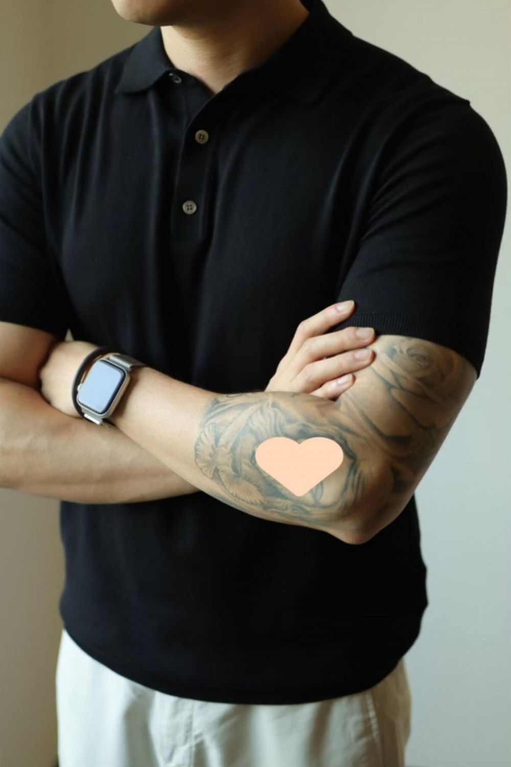 Men's plus size short sleeve polo with button detail in black.