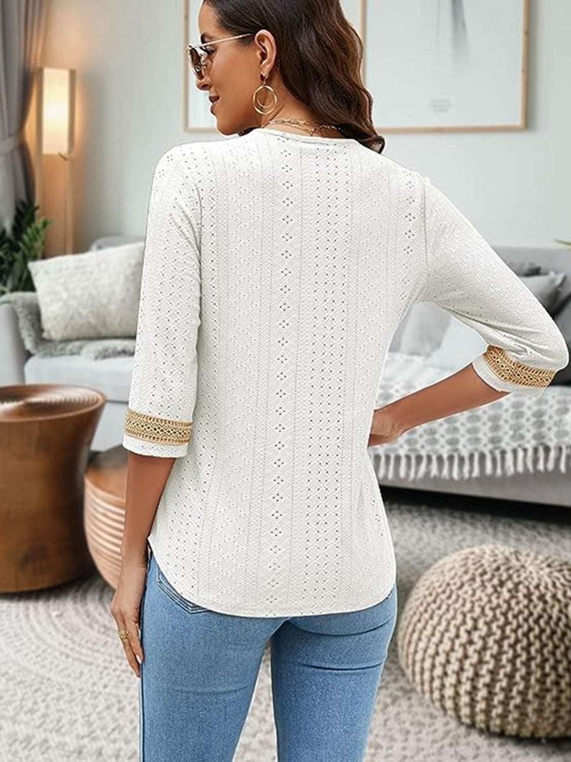 V-Neck Eyelet Blouse in white polyester fabric with 3/4 sleeves, shown from the back.