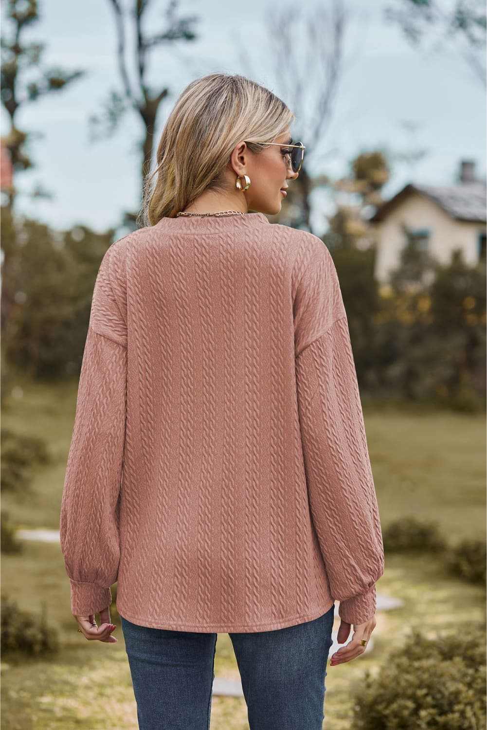 Solid casual V-neck dropped shoulder blouse with long regular sleeves, slightly stretchy material.