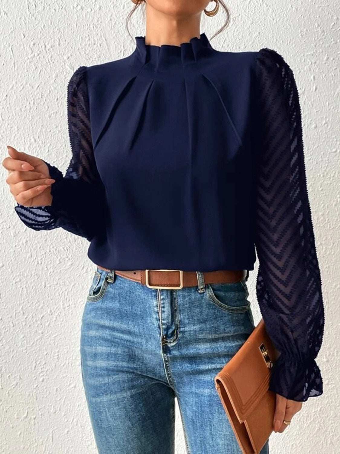 Mock neck flounce sleeve blouse with semi-sheer ruffled design.