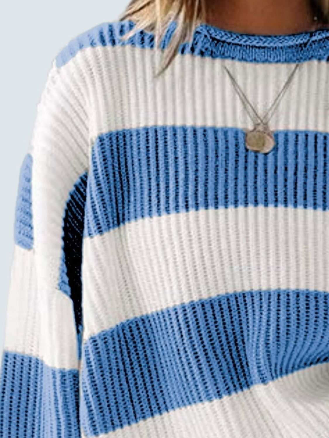 Round neck long sleeve sweater with blue and white stripes, slightly stretchy polyester.