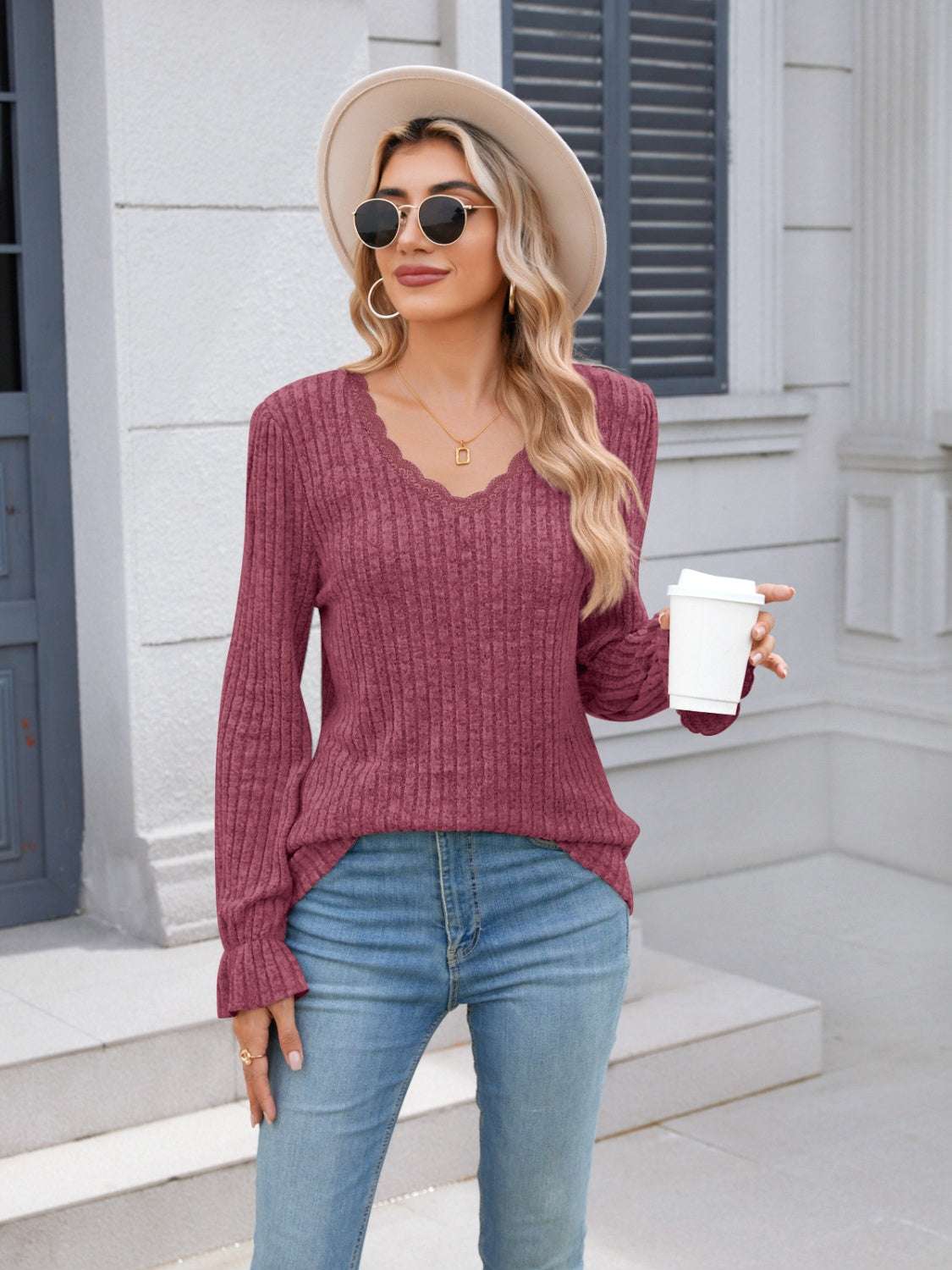 Lace detail V-neck long sleeve T-shirt in purple, worn by a woman holding a coffee cup.
