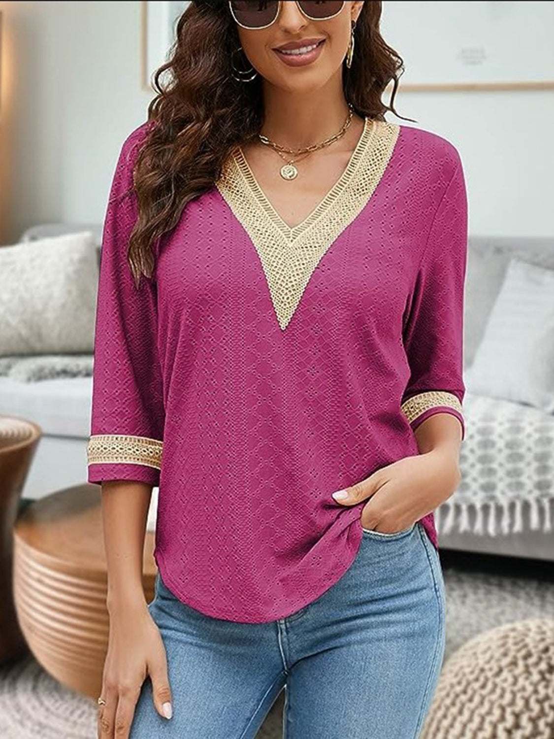 V-Neck Eyelet Blouse in purple with beige trim, 3/4 sleeves, non-stretch polyester fabric.