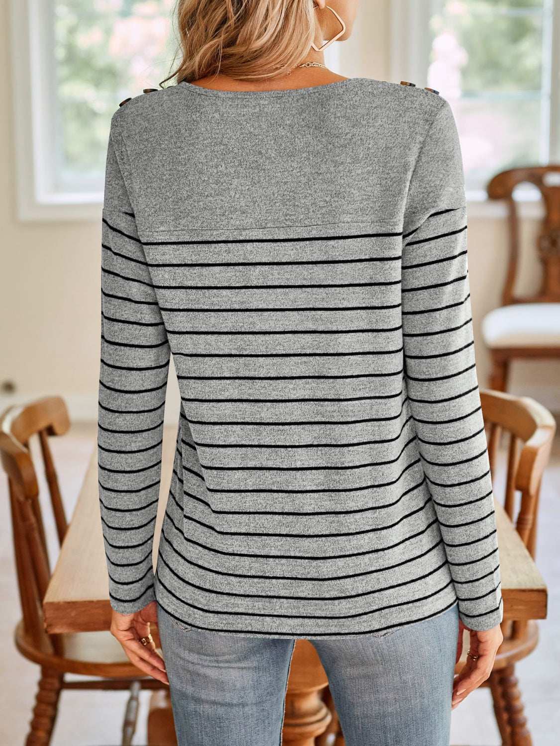 Lovelet striped round neck long sleeve t-shirt with decorative button detail.