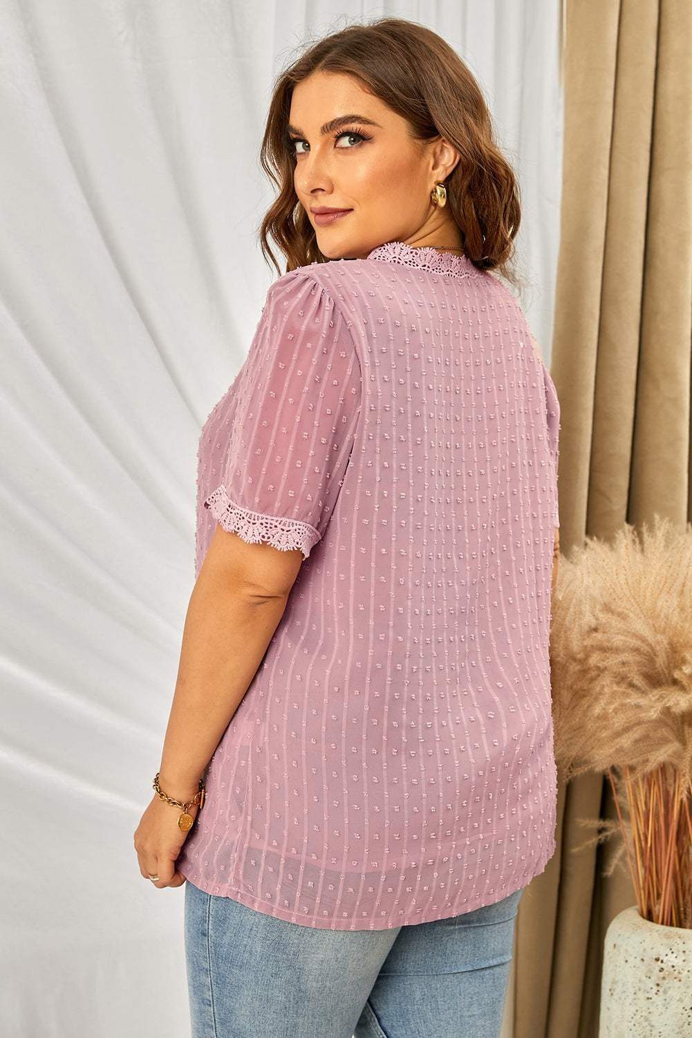 Plus size Swiss dot spliced lace V-neck blouse with short sleeves.