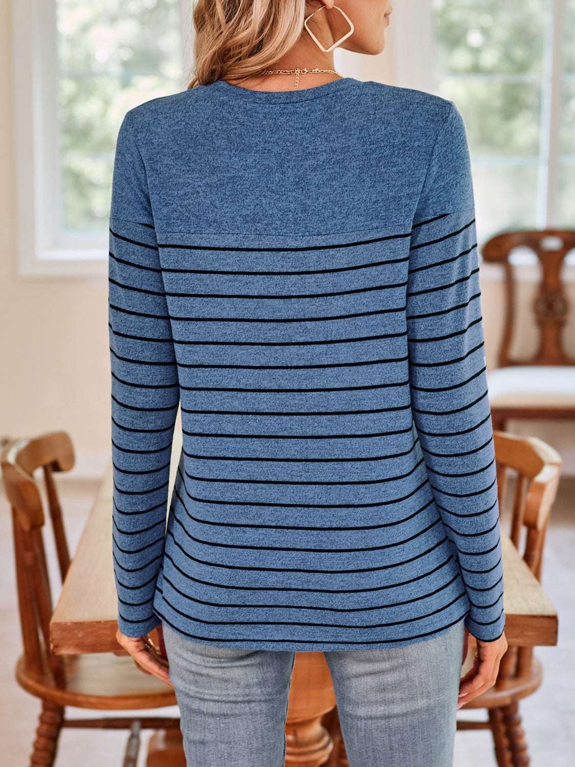 Lovelet quarter button striped round neck long sleeve t-shirt, blue and black stripes, casual style.