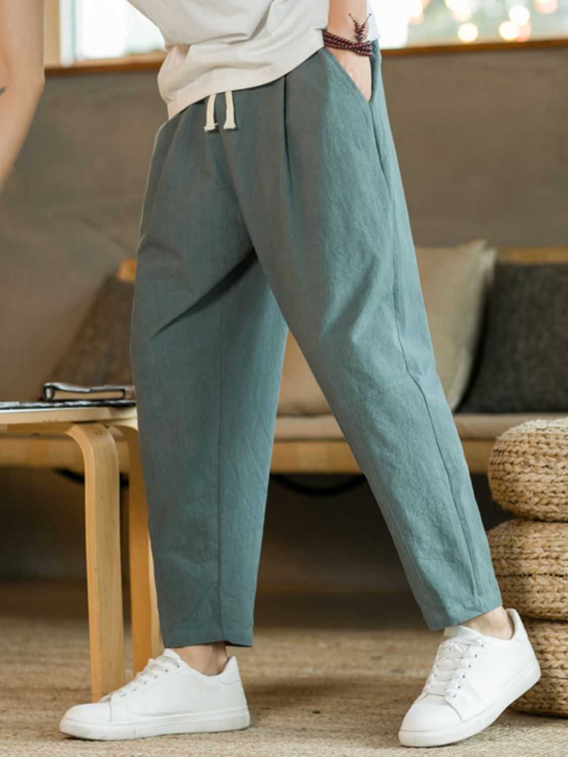 Plus size drawstring pants with pockets in blue, featuring basic style and comfortable fit.