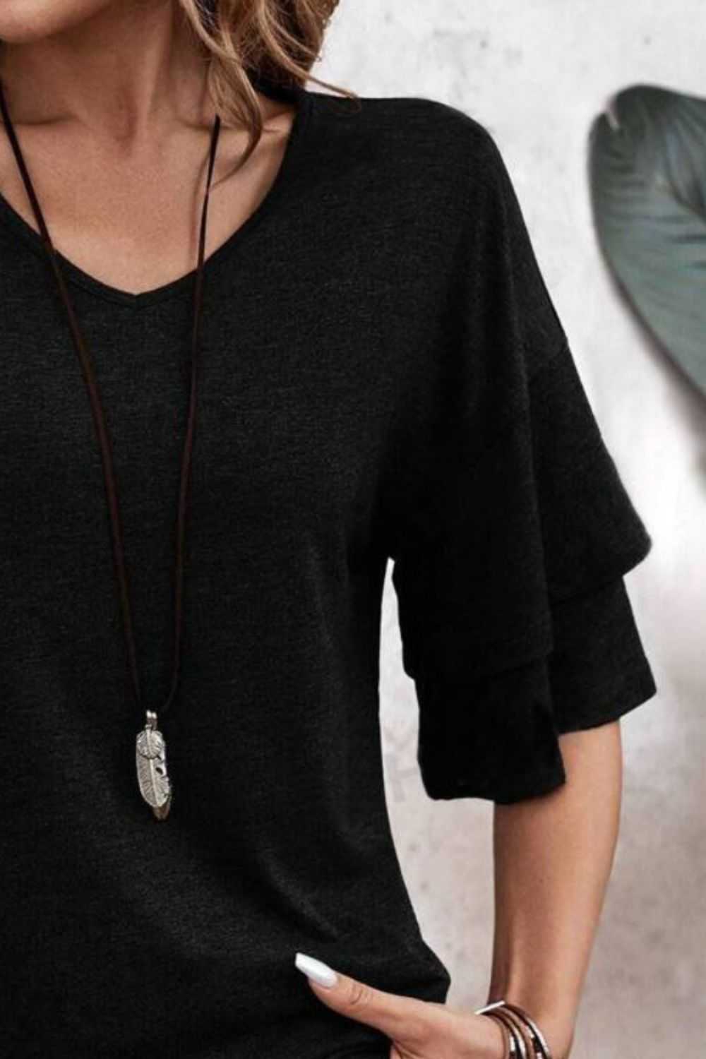 V-Neck Half Sleeve Blouse in black with slightly stretchy fabric, featuring a basic style.