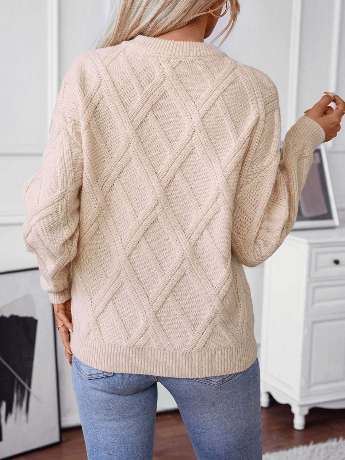 Geometric round neck long sleeve sweater in beige, featuring a basic style with slightly stretchy polyester material.