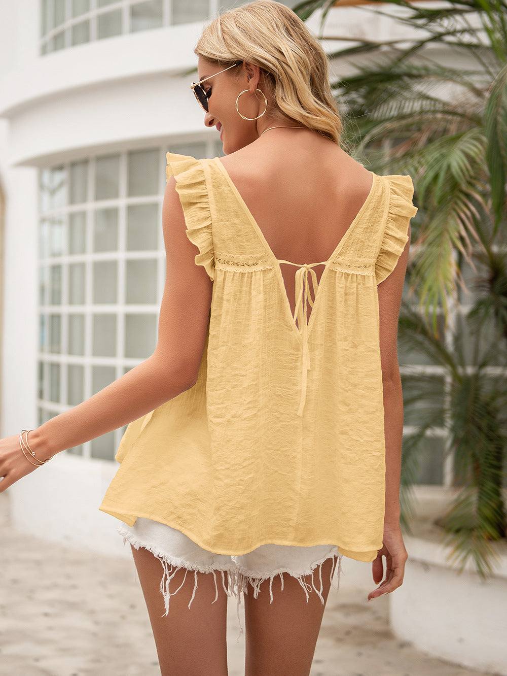 Ivy Lane Tie Back V-Neck Ruffled Blouse in solid yellow with cap sleeves and casual style.