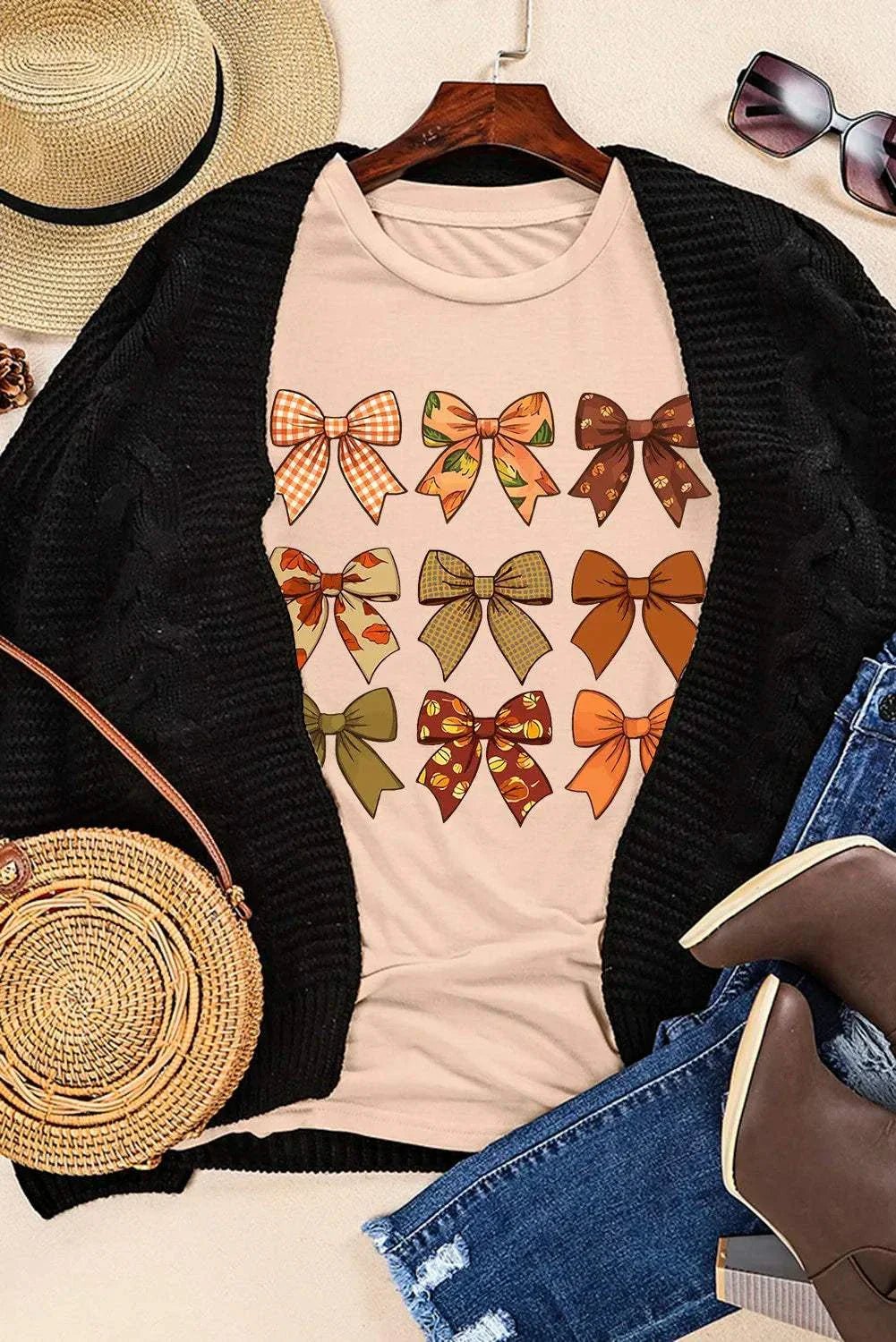 Bow graphic round neck short sleeve t-shirt with colorful bow design.