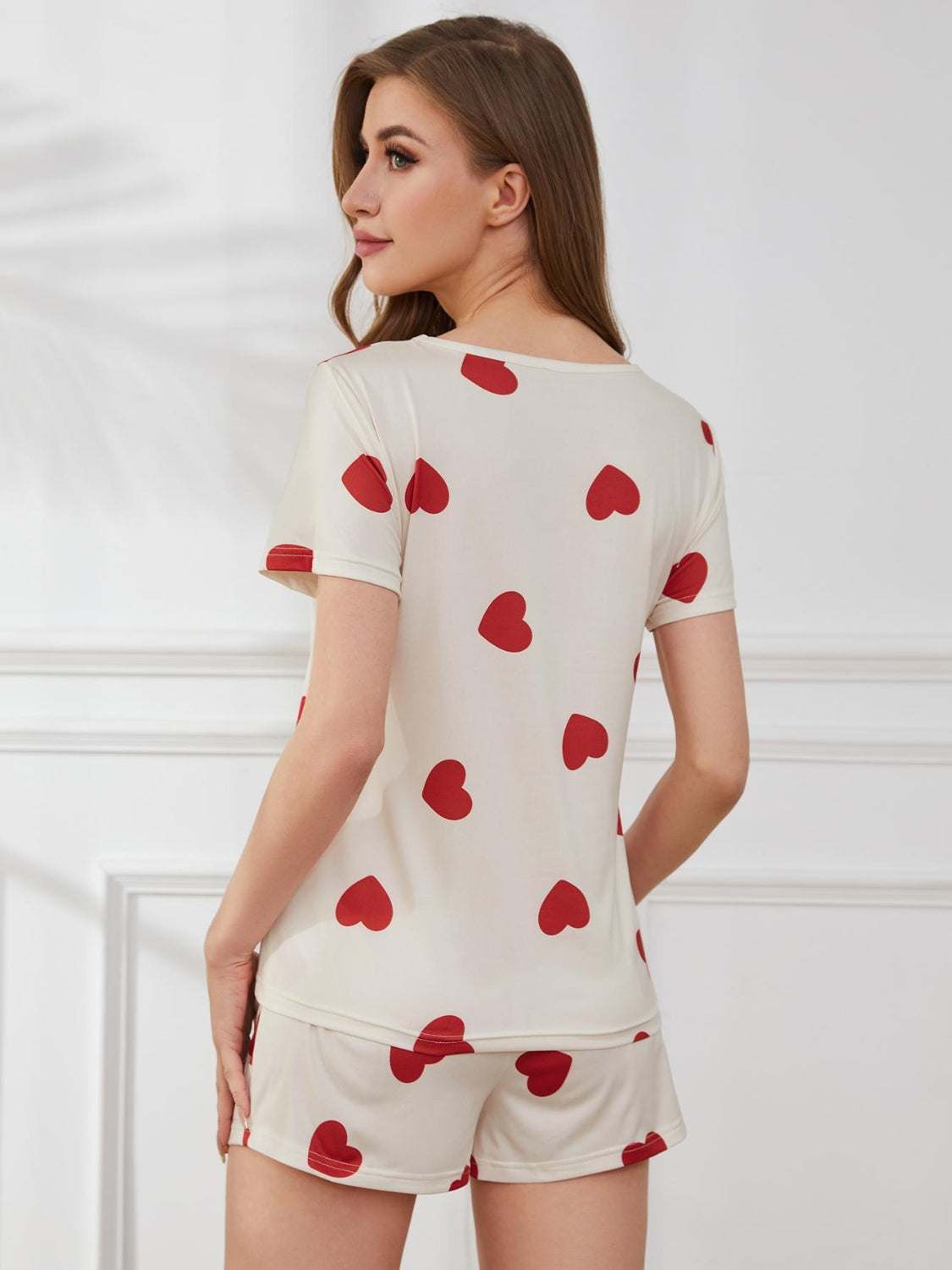 Heart round neck top and shorts lounge set with red heart pattern, two-piece, polyester-spandex blend.