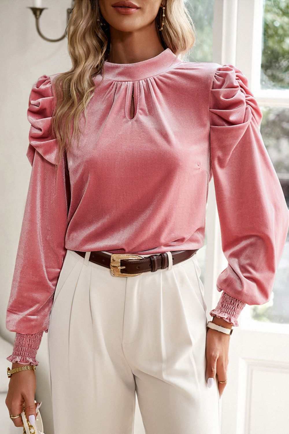 Mock neck velvet blouse with long sleeves and tie-up detail.