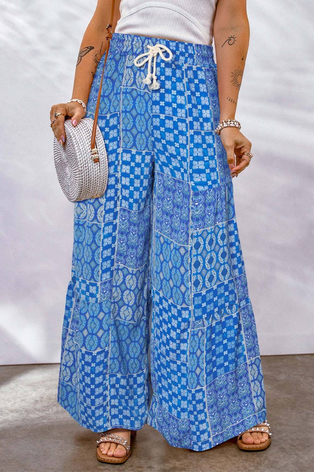 Full size drawstring printed wide leg pants in blue pattern.