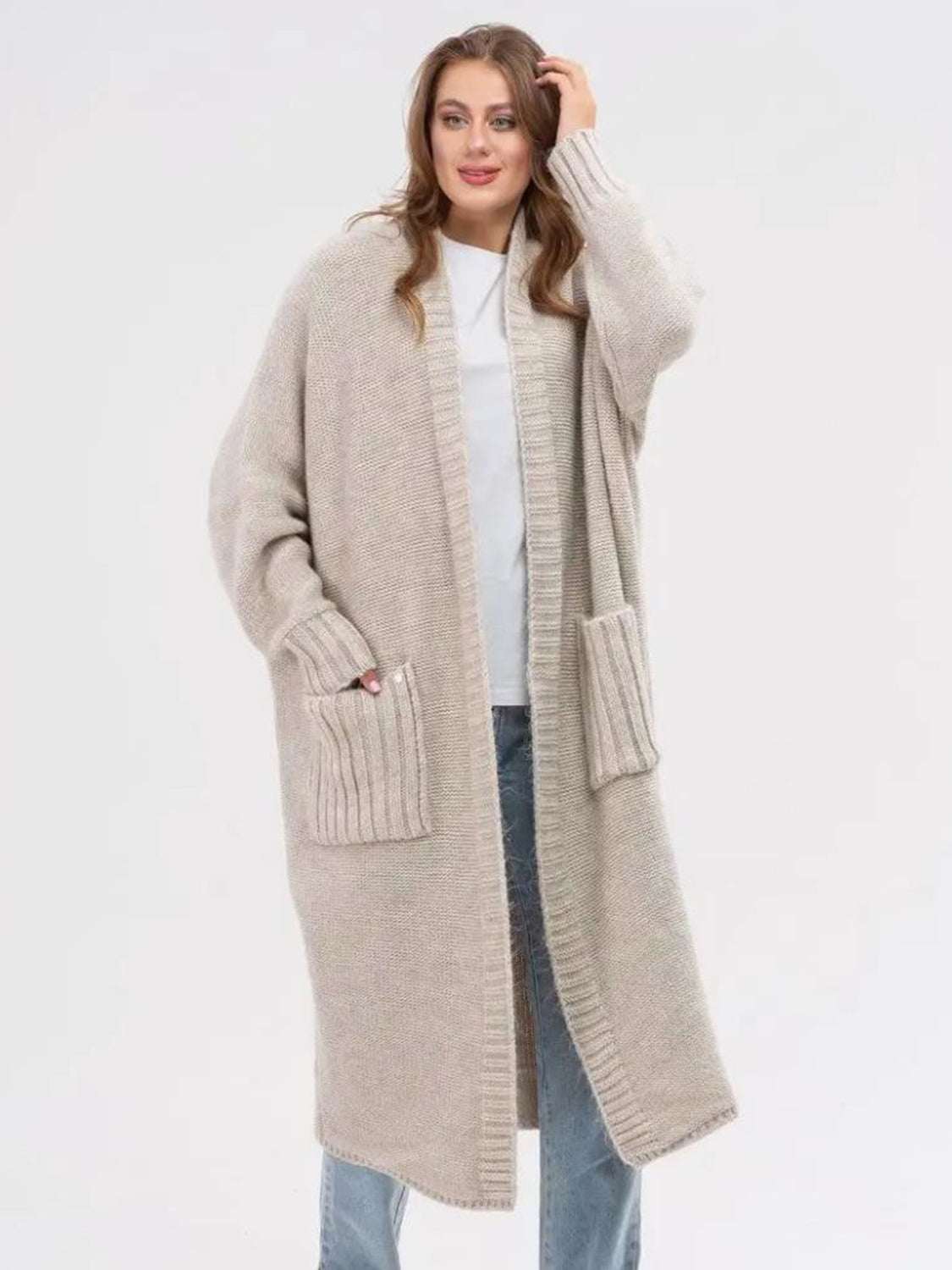 Pocketed open front long sleeve longline cardigan with moderate stretch.