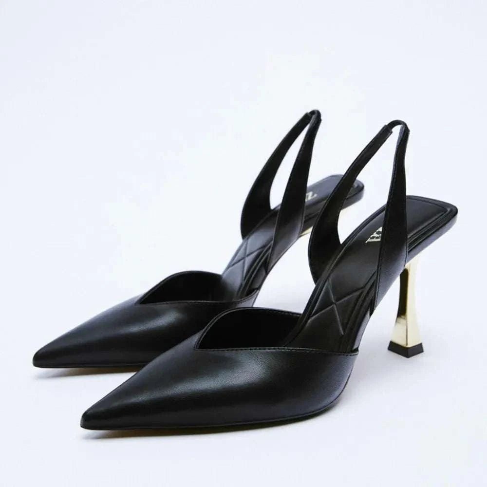 PU leather point toe stiletto heel pumps with high heel design.