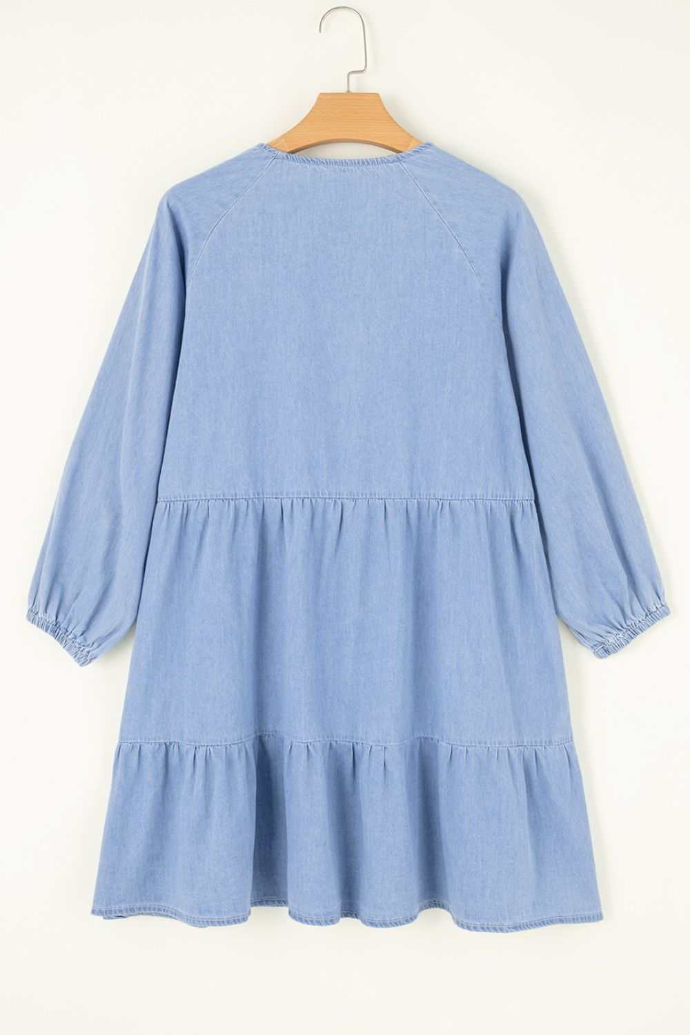V-Neck tiered ruffled hem mini dress in light blue, no stretch, cotton-polyester blend.