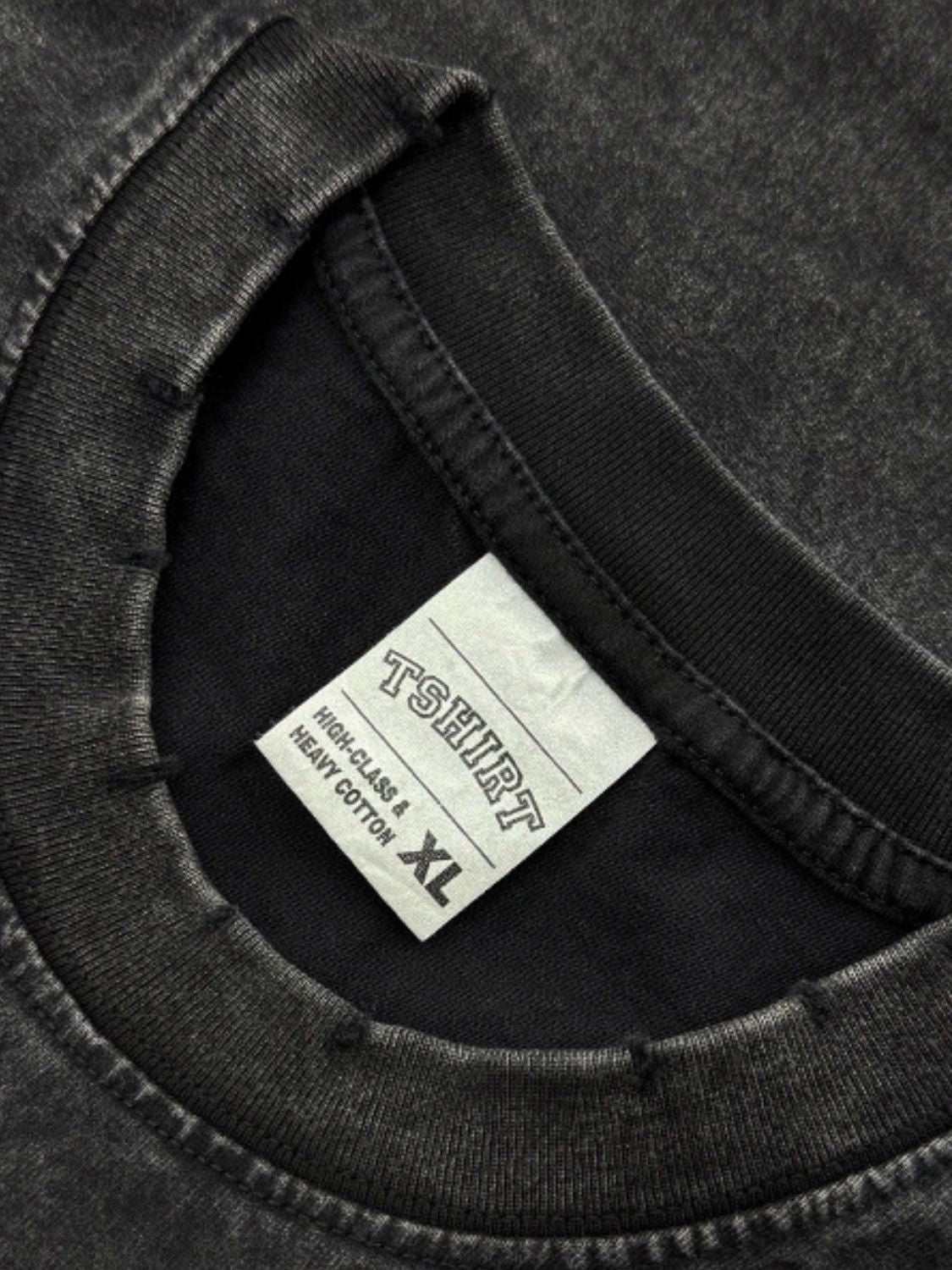 Men's full size washed round neck t-shirt, cotton blend, XL label close-up.