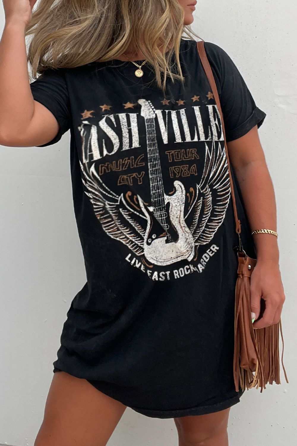 Graphic round neck short sleeve tee dress with music and guitar print design.