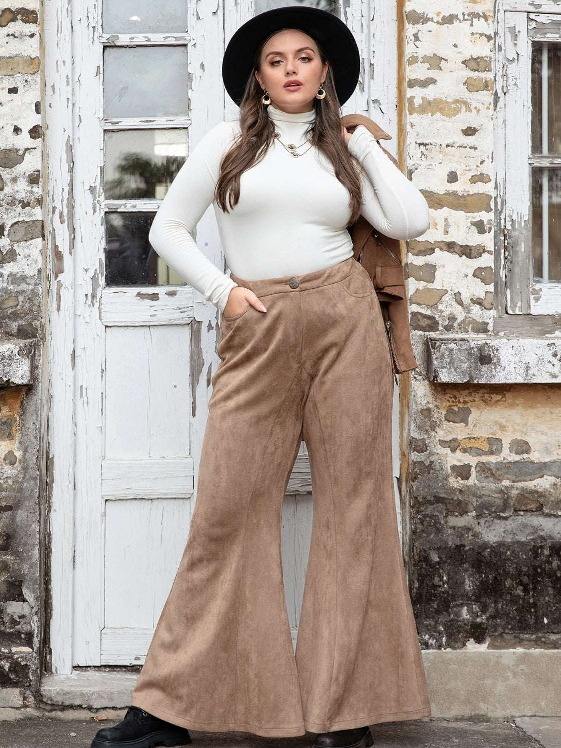 Plus size pocketed flare pants with a comfortable and stylish fit.