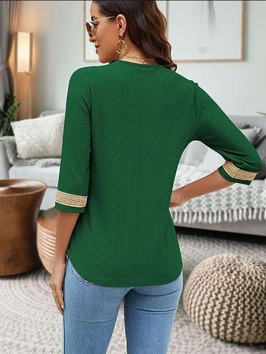 V-Neck Eyelet Blouse in green, featuring basic style with opaque fabric and no stretch; made from 100% polyester.