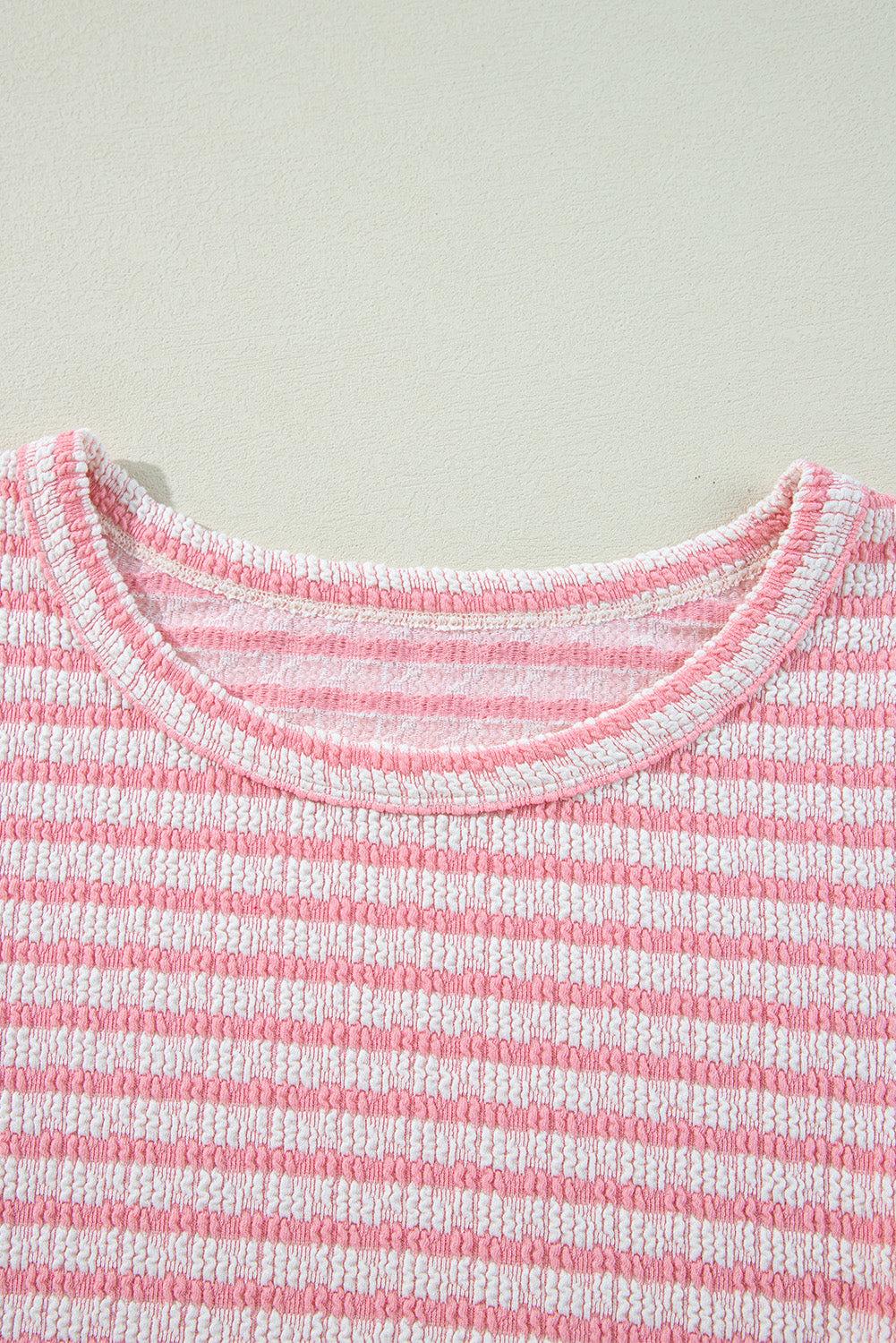 Stripe textured pink and white puff sleeve crewneck blouse.