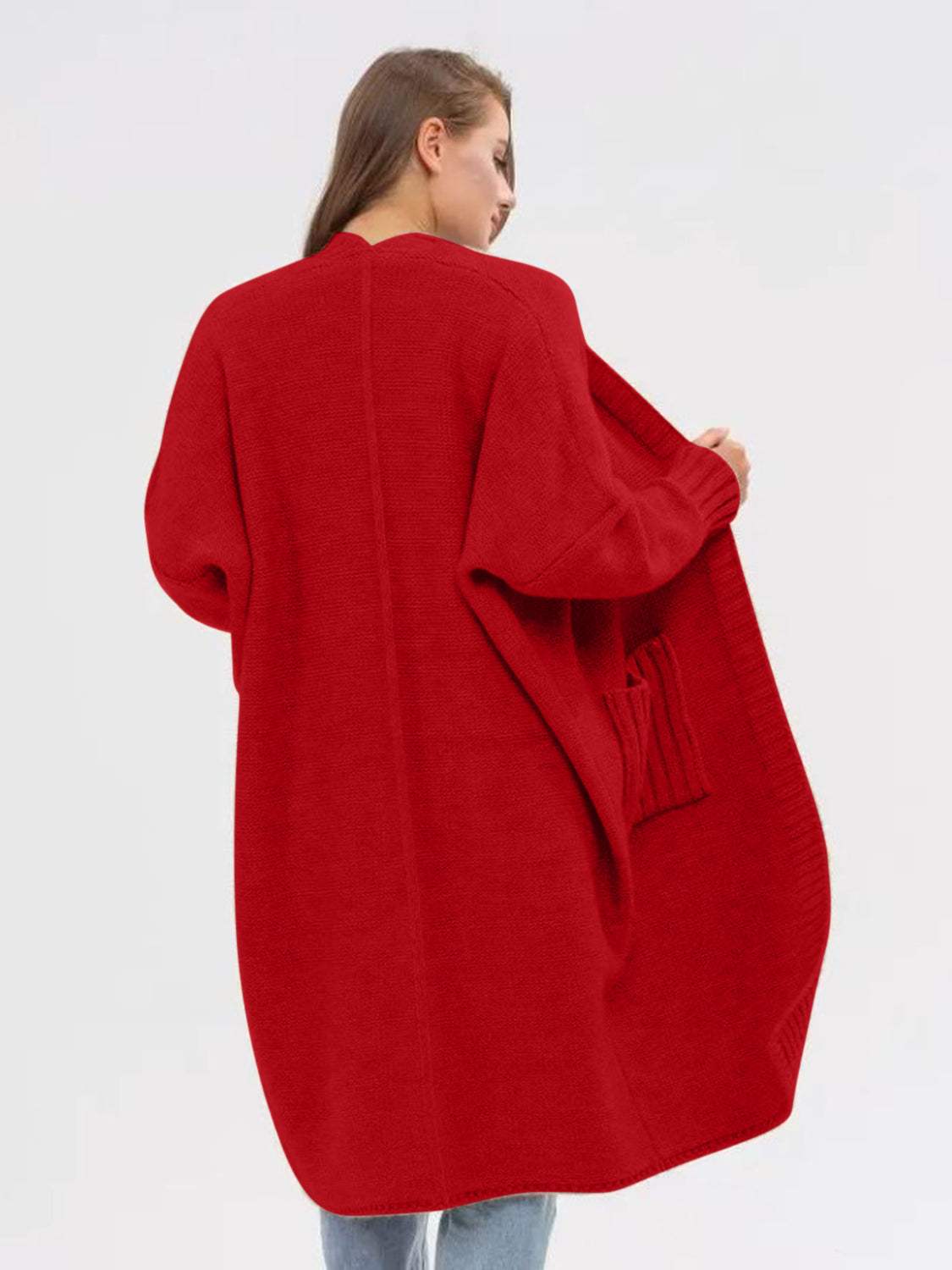 Pocketed open front long sleeve longline cardigan in red with moderate stretch.