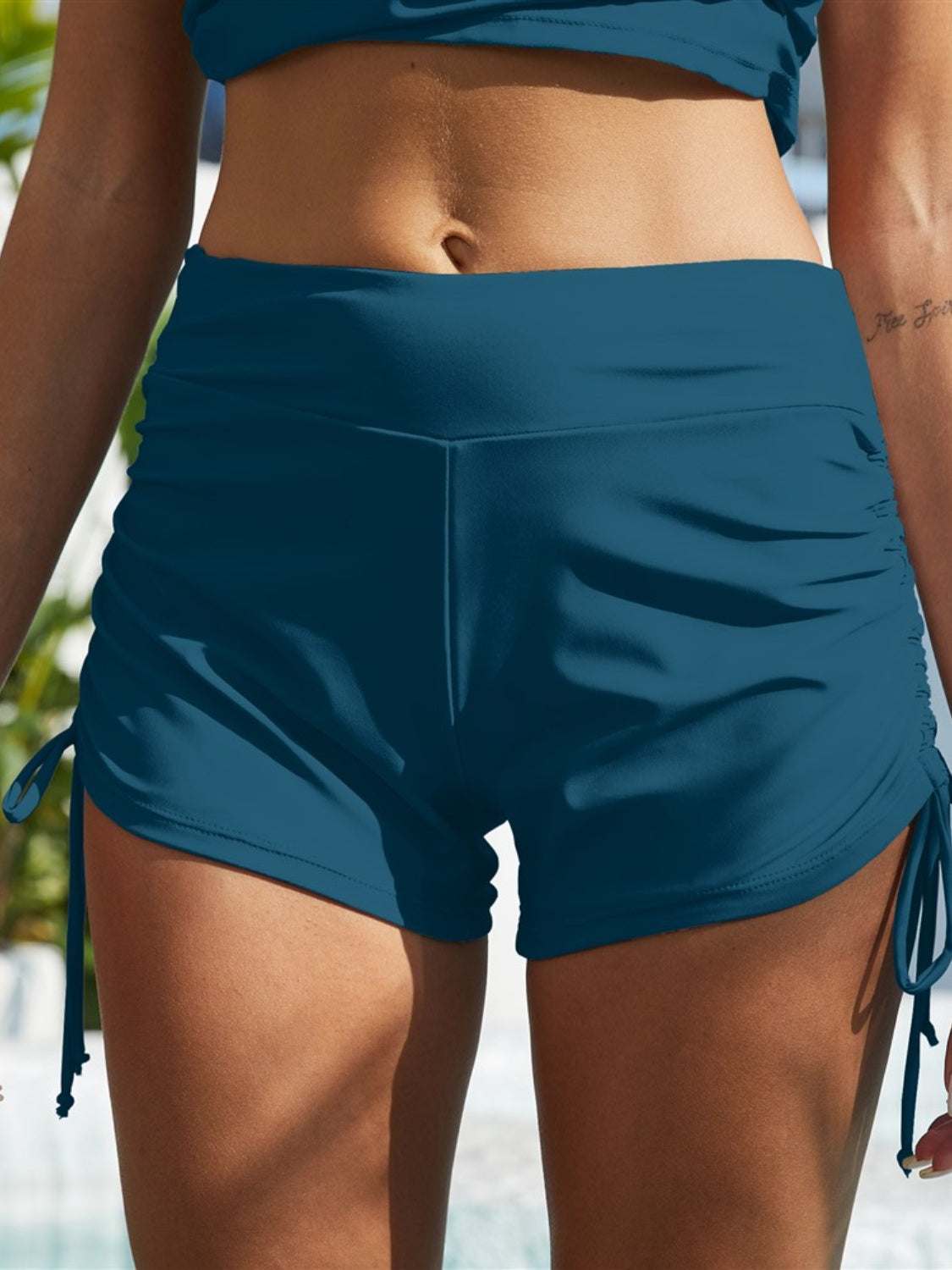 FAM-FAM Drawstring Mid-Rise Waist Swim Shorts, slightly stretchy, polyester-spandex blend, poolside.