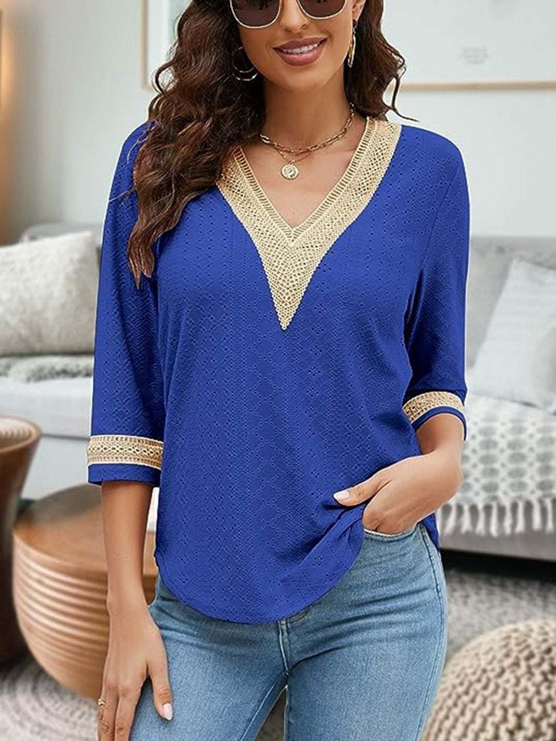 V-Neck Eyelet Blouse in blue, featuring a basic style with no stretch, made of 100% polyester.